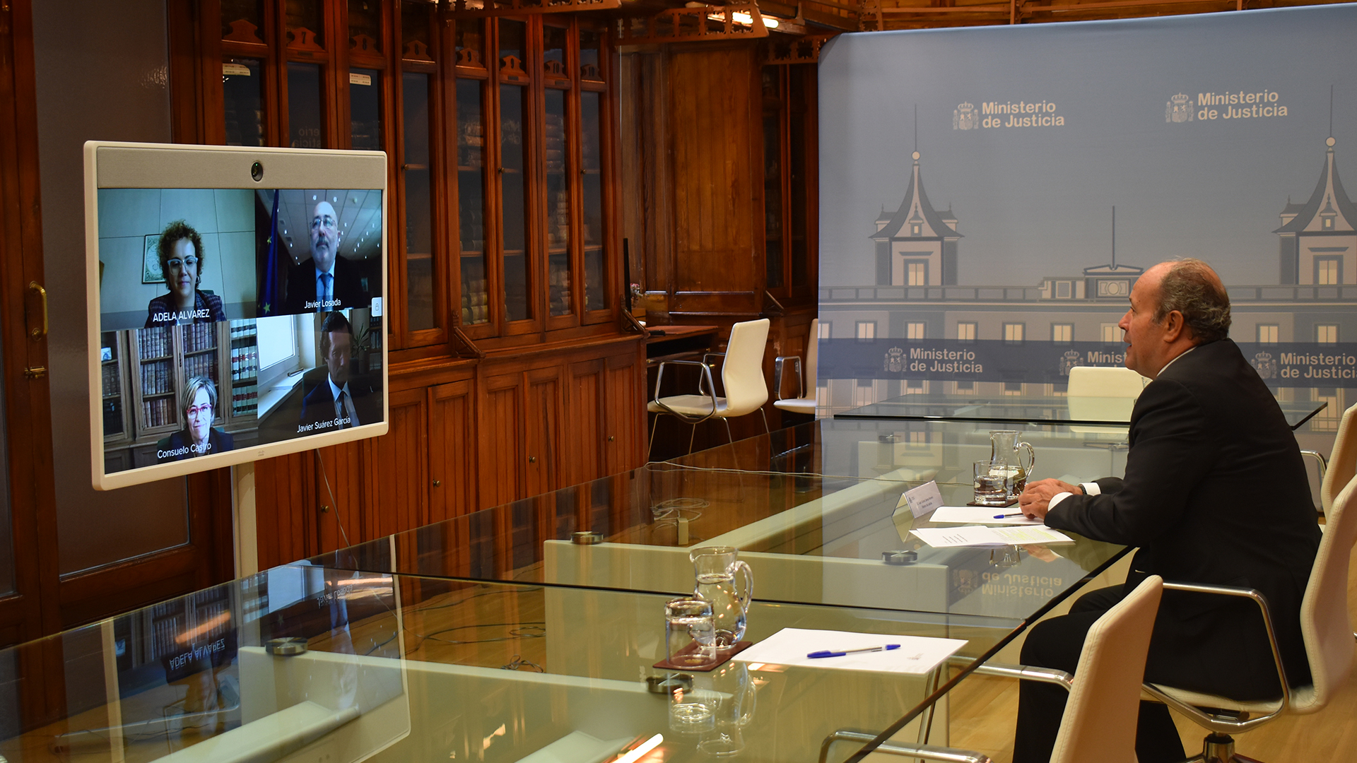 El ministro de Justicia, Juan Carlos Campo, durante su reuni&oacute;n por videoconferencia con el equipo jur&iacute;dico de la Abogac&iacute;a del Estado de Galicia